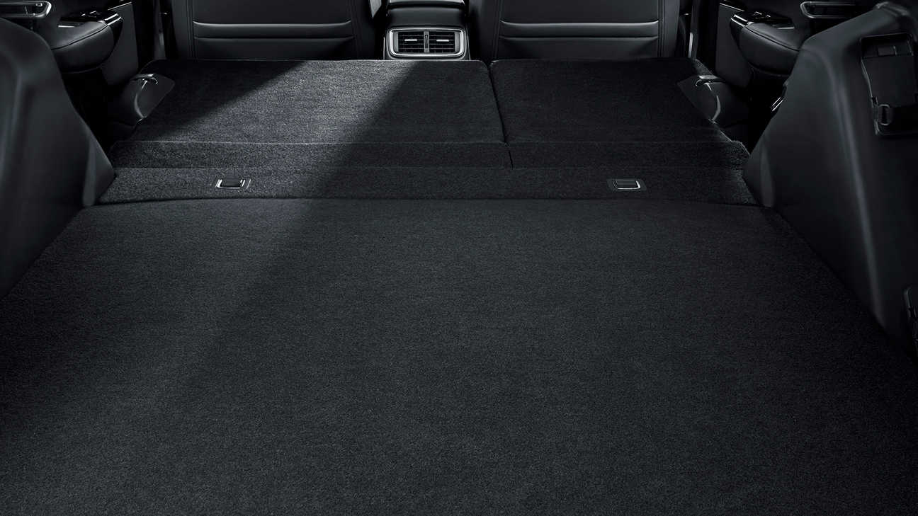 Vue de l'habitacle du Honda CR-V Hybrid illustrant la fonction sièges rabattables.