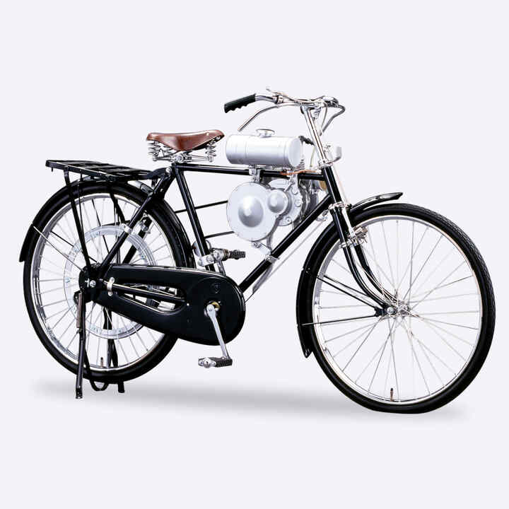 Vue de profil de la bicyclette Honda Type A avec générateur converti.